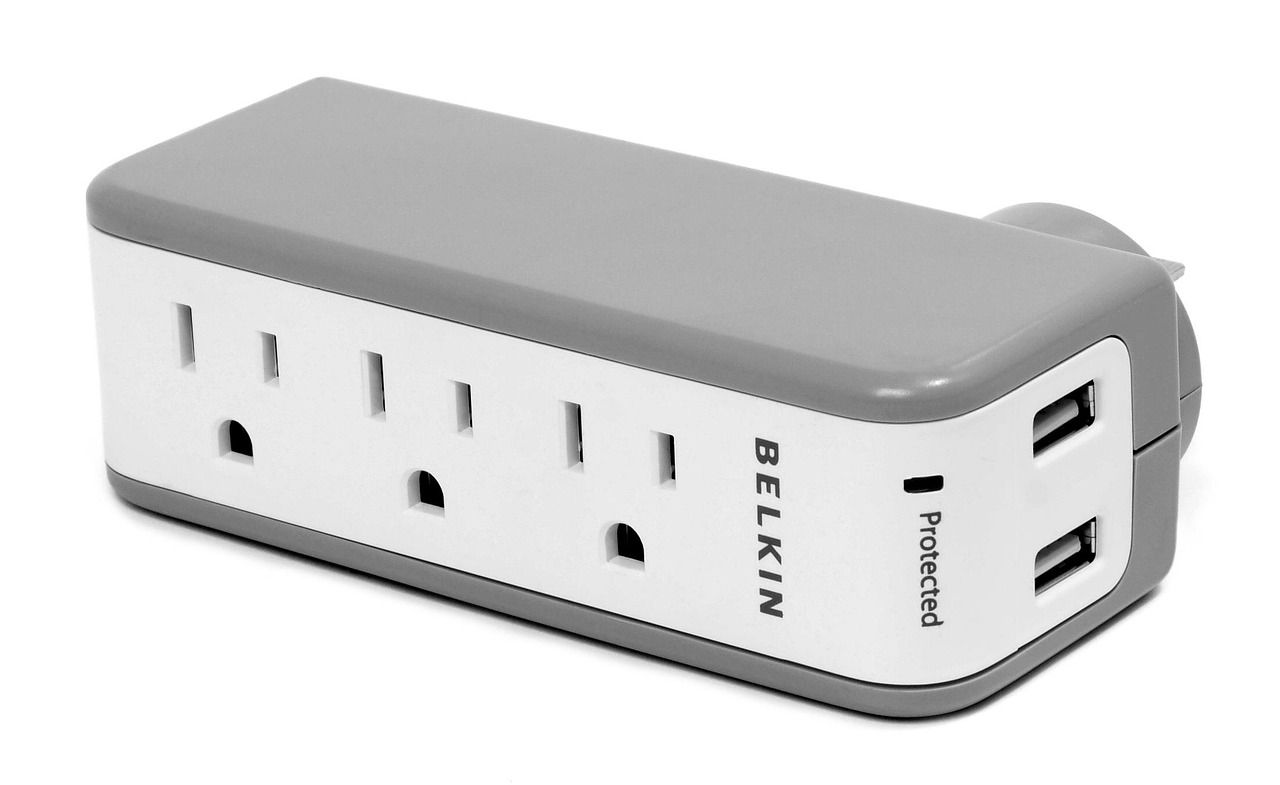 A surge protector power strip with multiple outlets